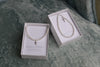Pearl Bracelet w/ Cross